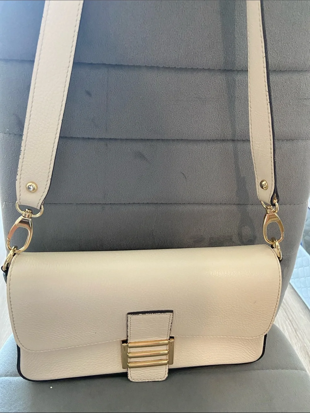 Cream Leather Shoulder Bag with Gold Buckle Accent